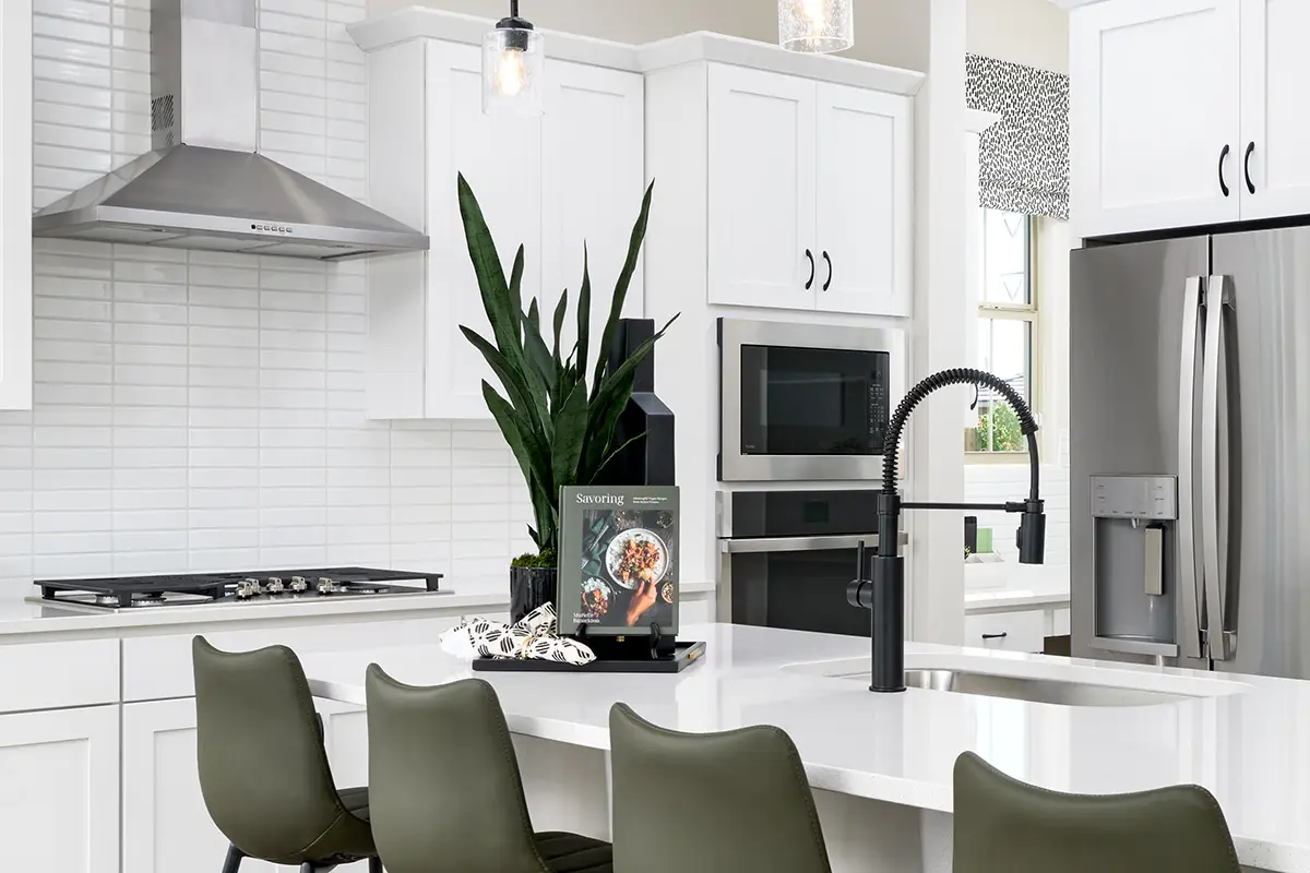 Raleigh floor plan kitchen with white cabinets and white countertops