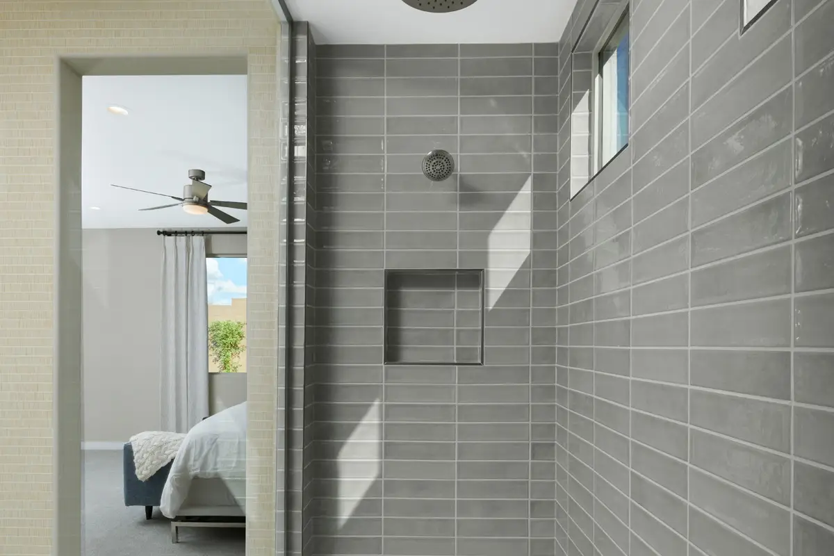 Shower detail with grey subway tile