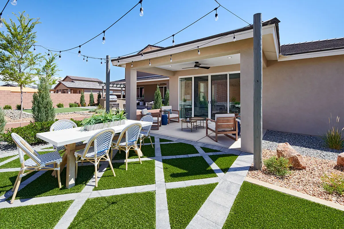 Outside patio with lawn furniture and ambient strung lighting