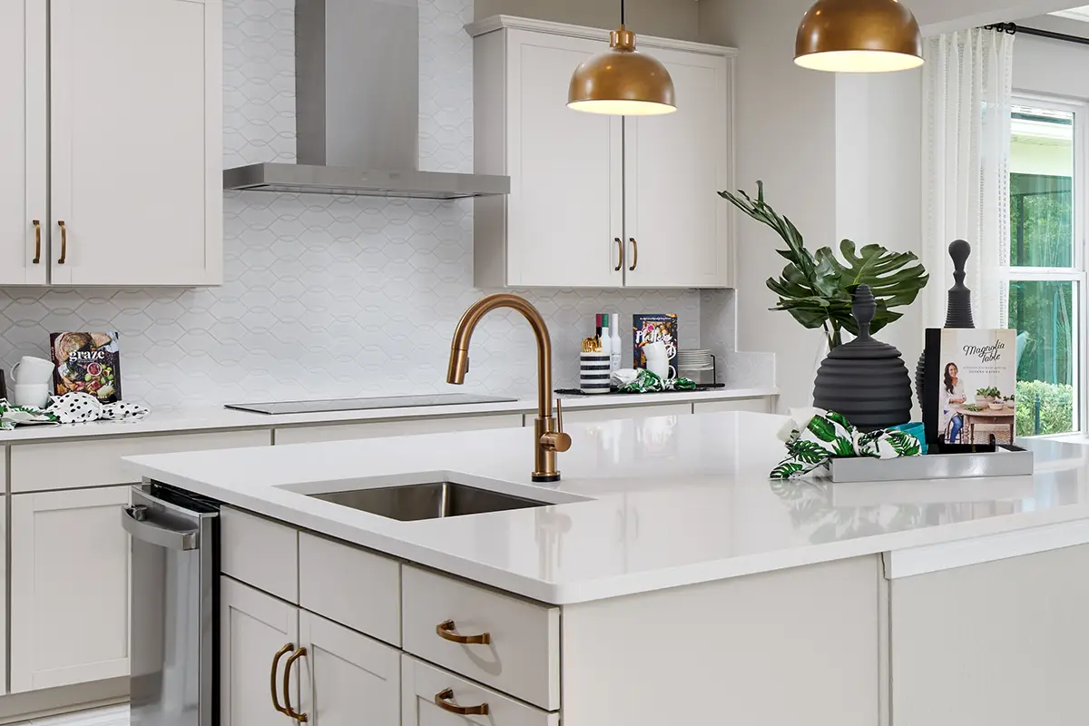 Single handle gold Delta kitchen faucet