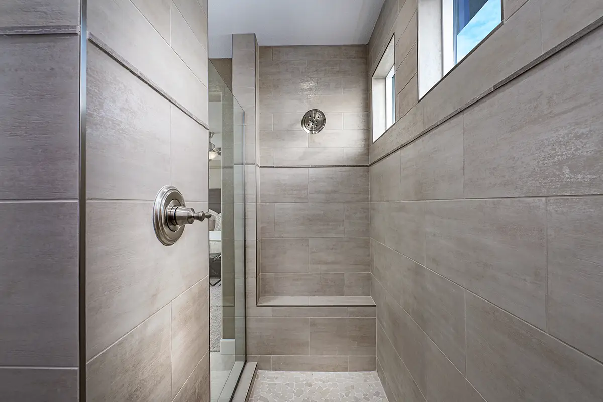 Fully tiled walk-in shower by Esmer Tile