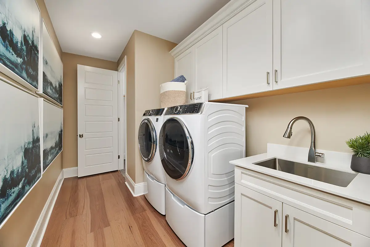 GE washer and dryer in a laundry room