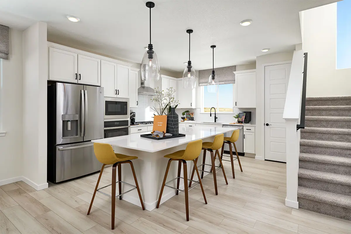 Kitchler glass pendent lights with black base in kitchen
