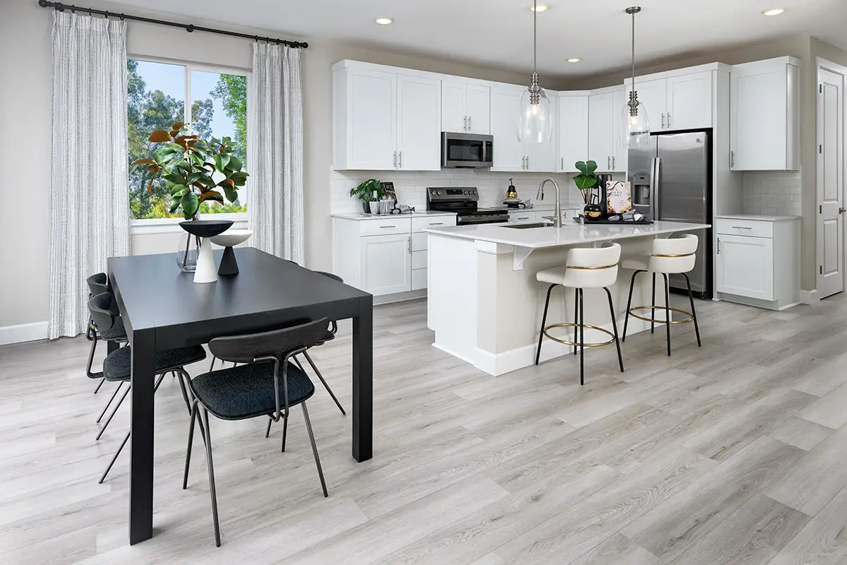 Kitchler glass pendent lights with silver base in kitchen