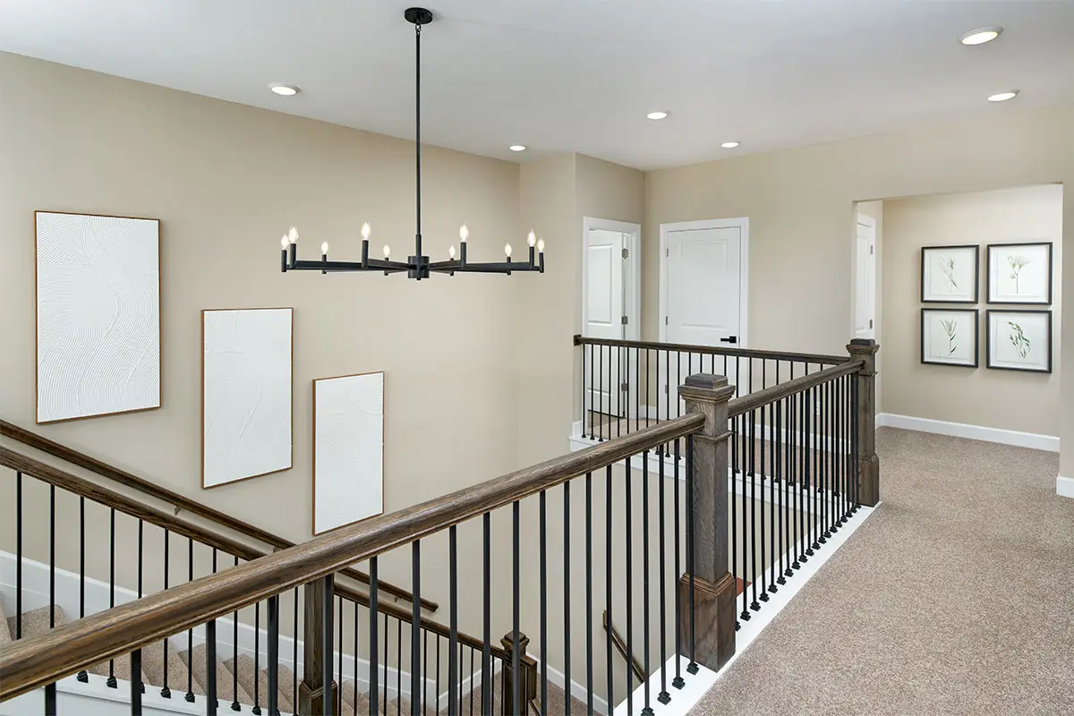Stairwell with Kitchler wrought iron chandelier