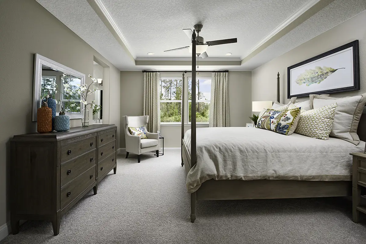 Secondary bedroom with a bed and Mohawk carpet